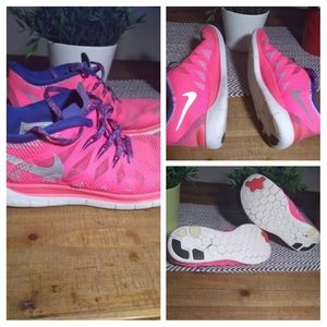 Used women's Nike free 5.0 running shoes size 7y / 8.5 women pink